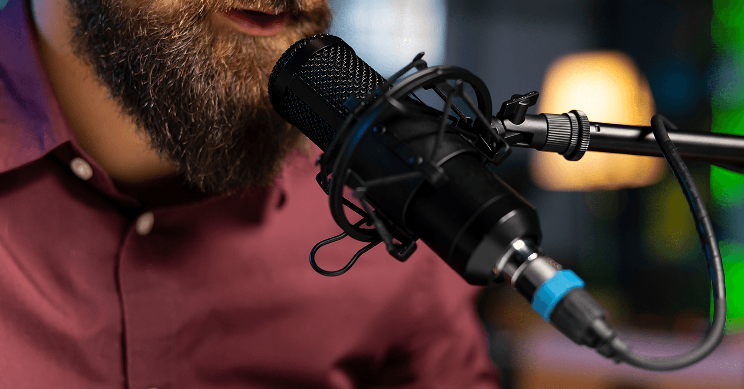 Man speaking into microphone